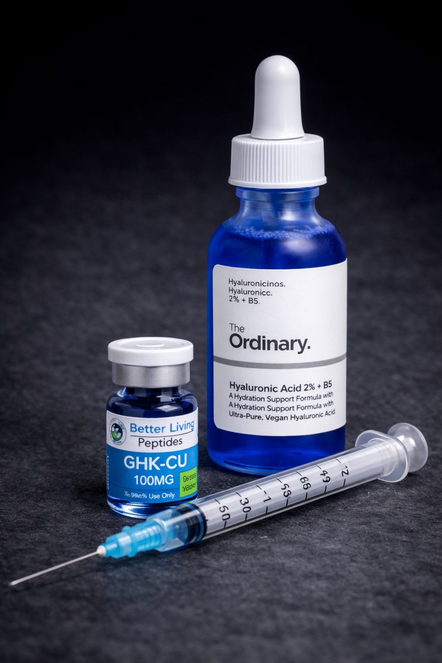 GHK-Cu 100mg vial, The Ordinary Hyaluronic Acid 2% + B5 serum bottle, and a sterile syringe
